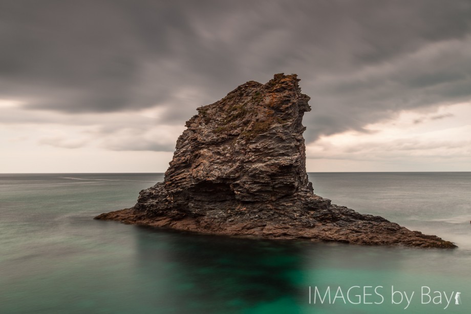Image of Rock in Turquoise Water